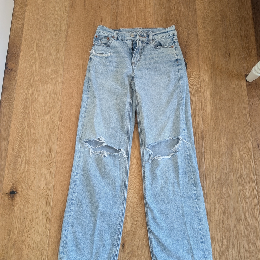 Women's Light Blue Distressed Jeans